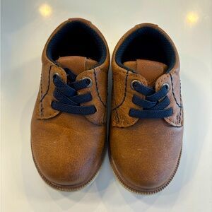 Slip on brown Oxford dress shoes. Size 5.
